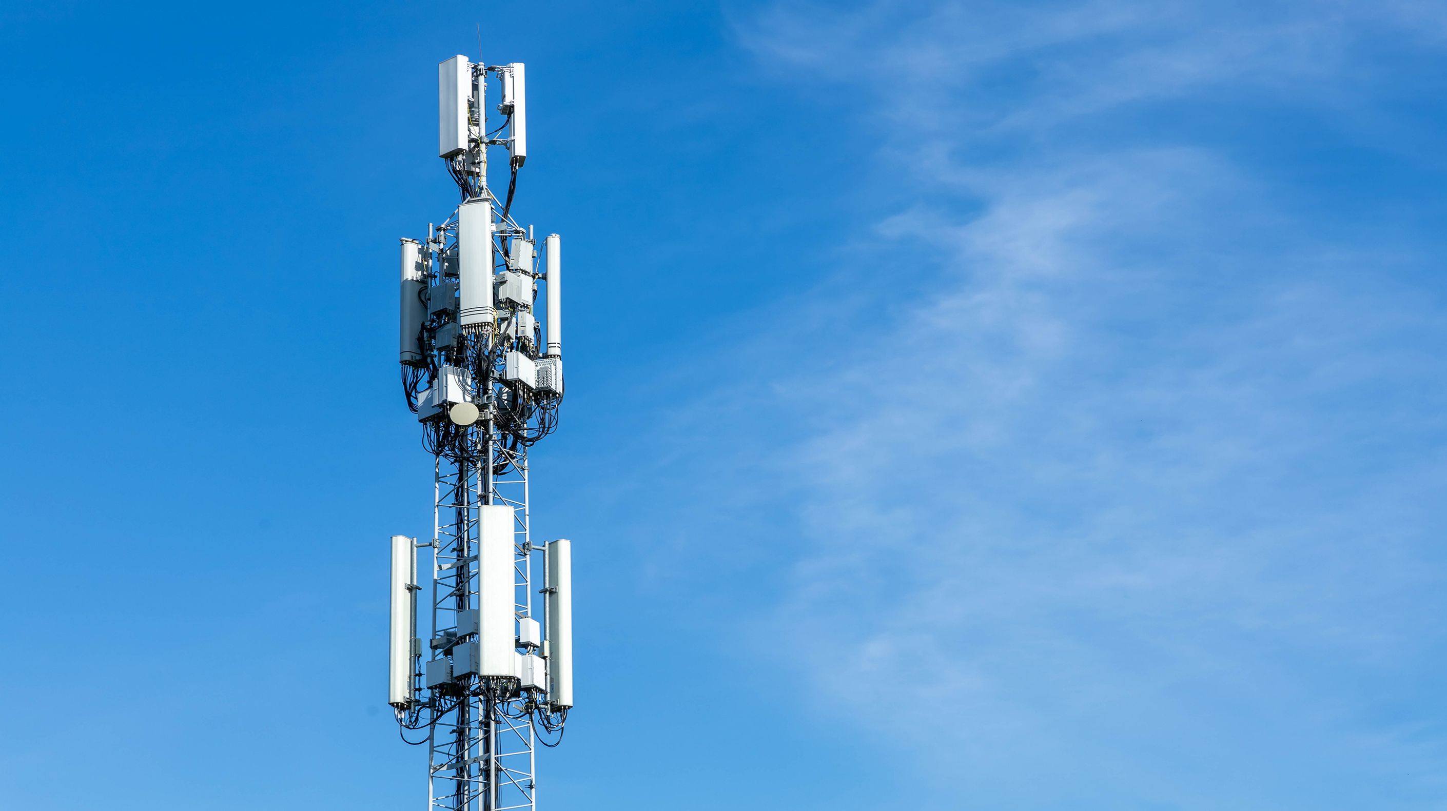 5G tower with the sky as a background drop