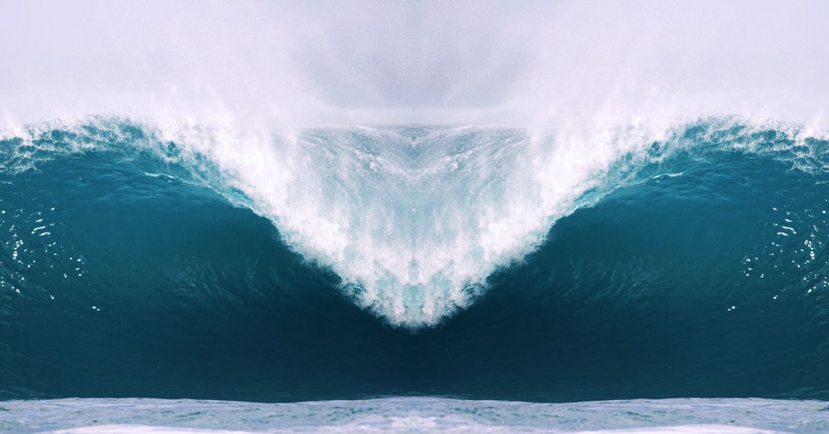 Front view of a large wave crashing down.